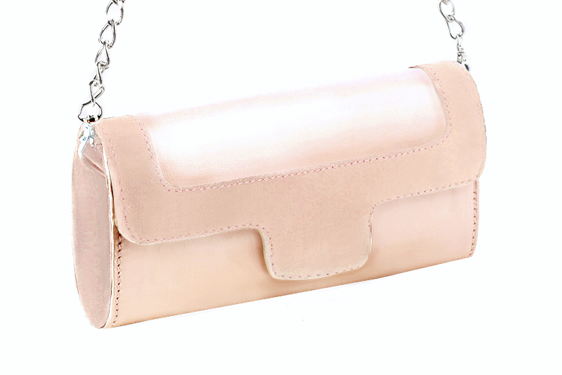 Handcrafted women's elegant clutch in premium powder pink leather. Perfect for weddings, ceremonies, and parties.  
                Choose from our luxurious collections of leather and fabric to perfectly match your clutches to your outfits.